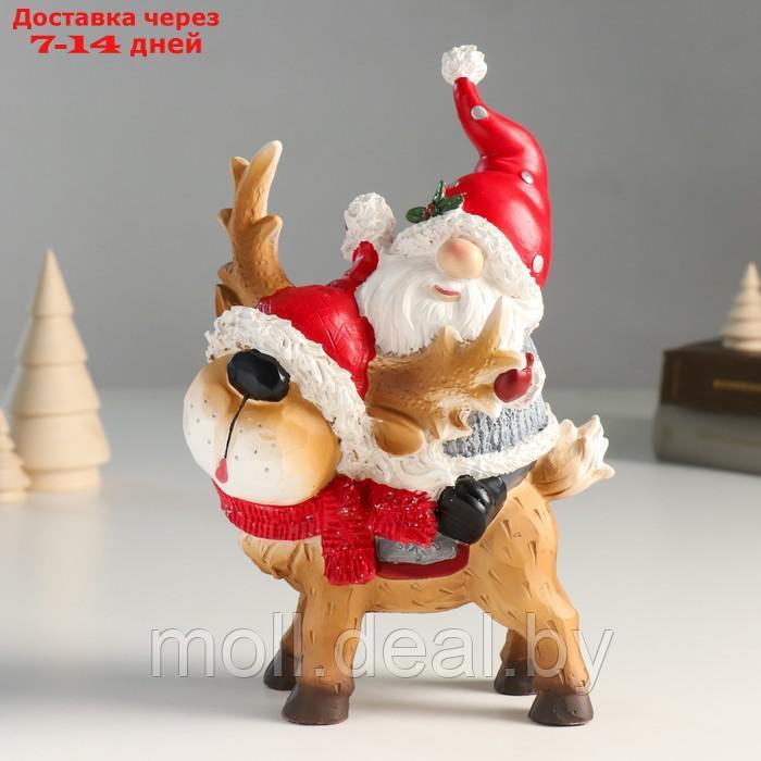 Сувенир полистоун "Дед Мороз верхом на олешке в красном колпаке и шарфике" 8х14х23 см - фото 1 - id-p216352697