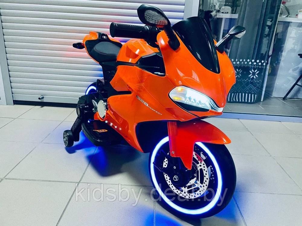 Детский электромобиль, мотоцикл RiverToys A001AA (оранжевый) Ducati - фото 1 - id-p26159472