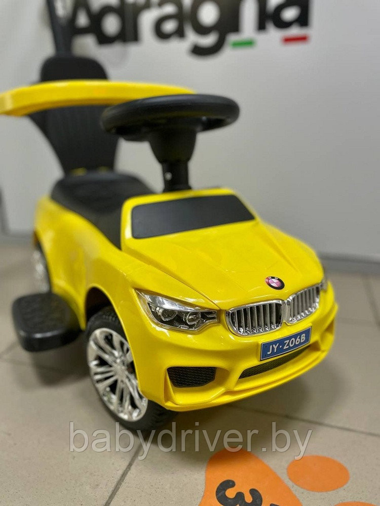 Детская машинка-каталка, толокар RiverToys BMW JY-Z06B (желтый) с ручкой-управляшкой - фото 1 - id-p116443643