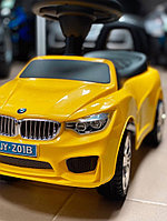 Детская машинка-каталка, толокар RiverToys BMW JY-Z01B (желтый/черный)