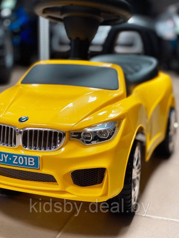 Детская машинка-каталка, толокар RiverToys BMW JY-Z01B (желтый/черный) - фото 1 - id-p139551625