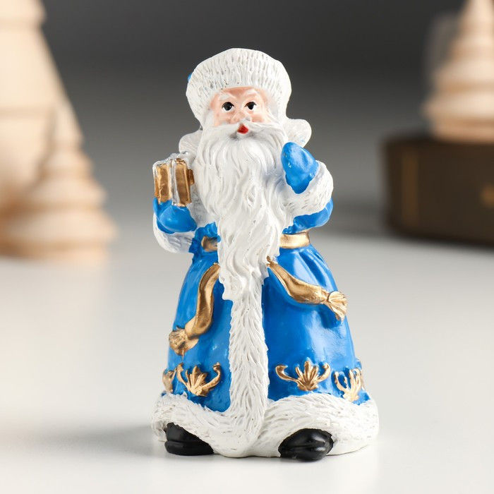 Сувенир полистоун "Дед Мороз в синем кафтане с подарком" 5х4,5х8,2 см - фото 1 - id-p218178560