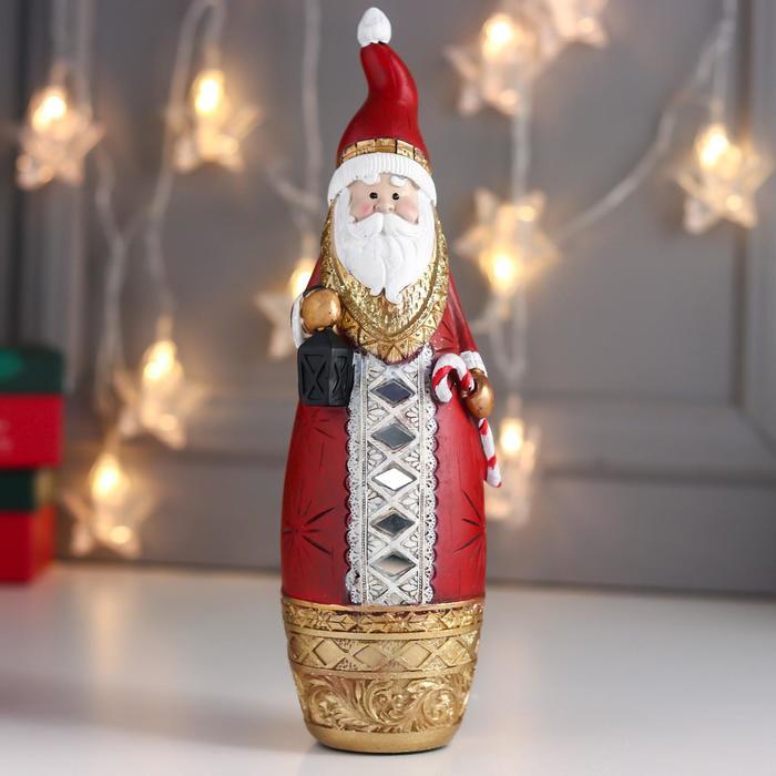 Сувенир полистоун "Дед Мороз в красной шубе с золотом, с фонарём и конфетой" 28,5х8х8,5 см - фото 1 - id-p218179271