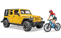 Игрушка Внедорожник Jeep Wrangler Rubicon с велосипедом и фигуркой Bruder 02543