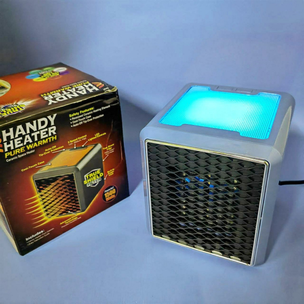 Портативный 3-х скоростной обогреватель с LED подсветкой Handy Heater Pure Warmth 1500W, 220V - фото 7 - id-p219627490