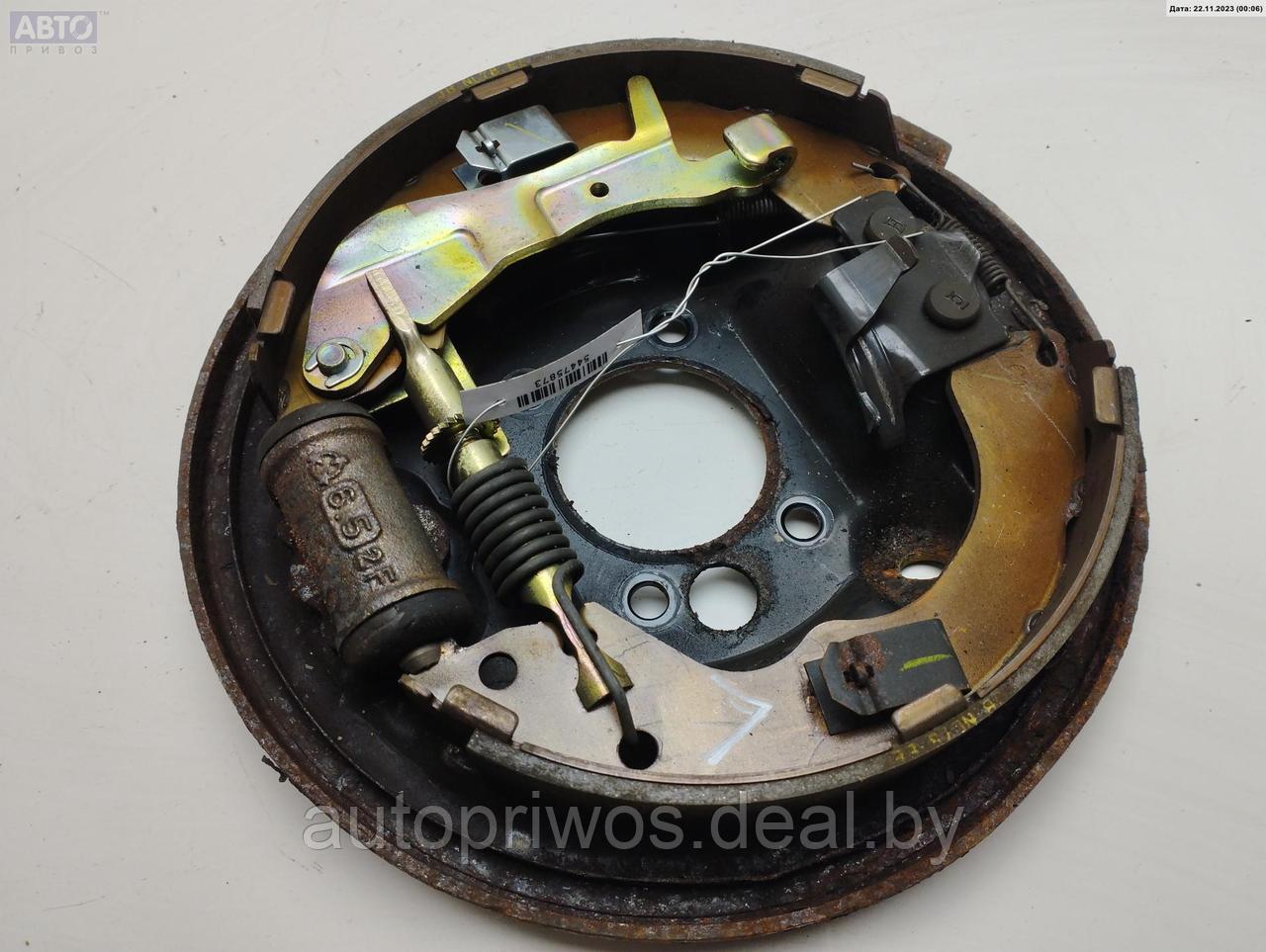 Щиток (диск) опорный тормозной задний левый Mazda Premacy - фото 1 - id-p219710774
