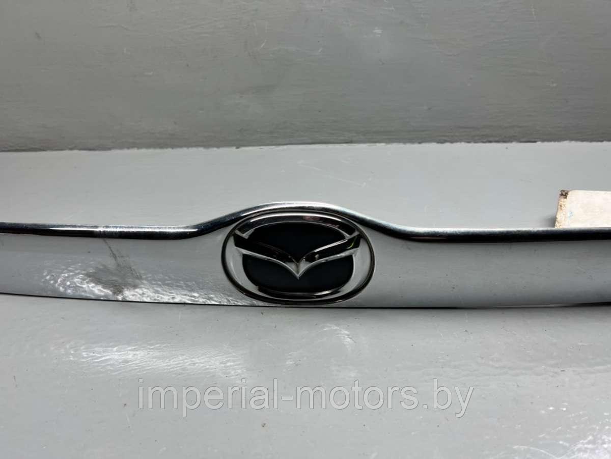 Накладка подсветки номера Mazda Tribute 1 - фото 3 - id-p219586035