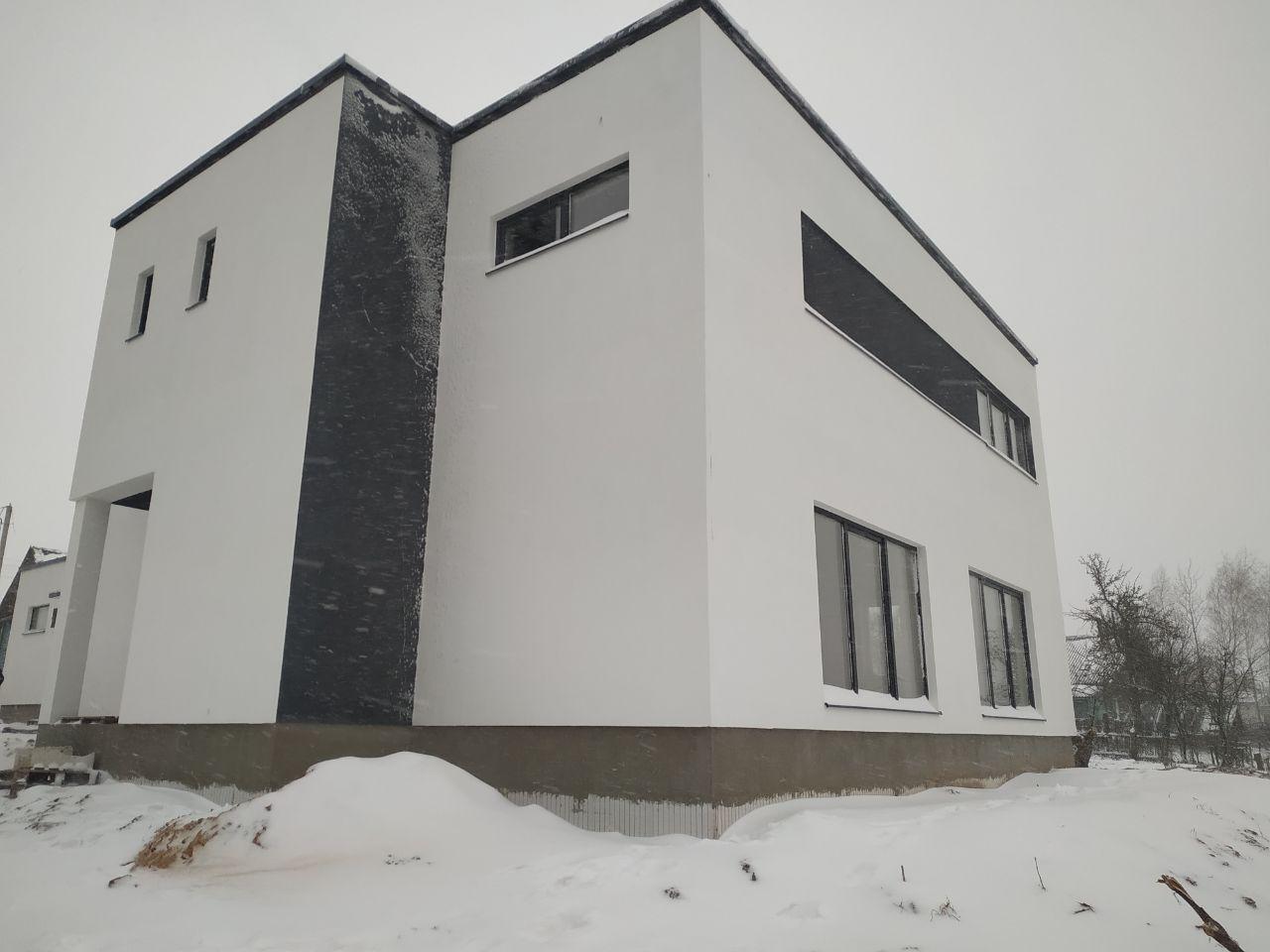 Двухэтажный коттедж с плоской кровлей