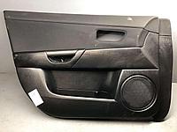 Обшивка двери передней левой (дверная карта) Mazda 3 BK