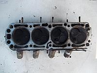 Головка блока цилиндров двигателя (ГБЦ) Opel Astra G