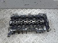 Головка блока цилиндров двигателя (ГБЦ) Opel Combo C