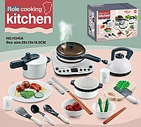 Игровой набор посуды с плитой.