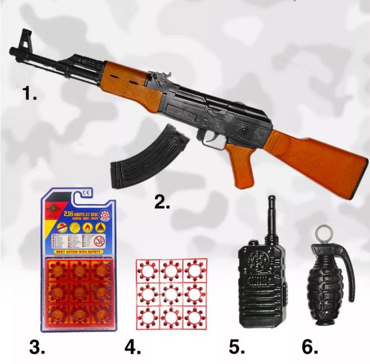 Игрушечный автомат на пистонах.