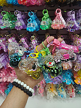 Мотоцикл с плавающей фигуркой - брелок с водичкой.