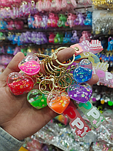 Брелок сердечко с водичкой и блестками.