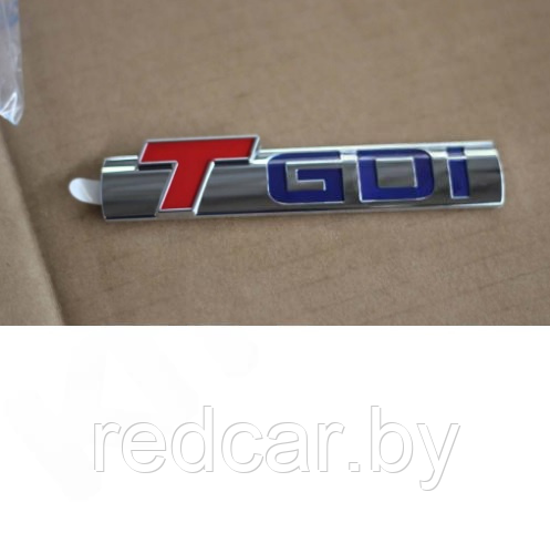 Надпись слева TGDI Geely Atlas