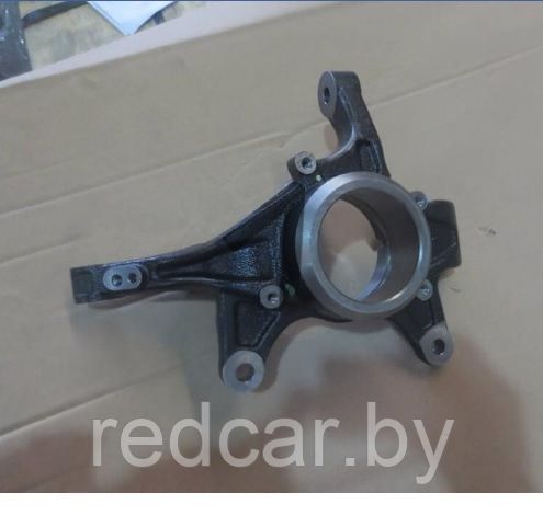 Кулак поворотный левый Geely Atlas