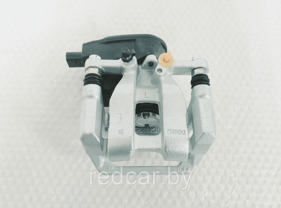 Суппорт тормозной задний левый Geely Atlas