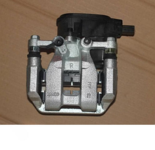 Суппорт тормозной задний правый Geely Atlas