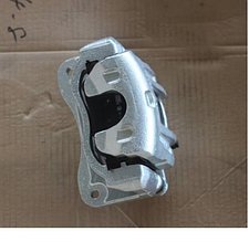 Суппорт тормозной передний левый Geely Atlas