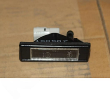 Фонарь освещения номерного знака Geely Atlas