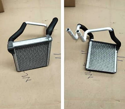 Радиатор отопителя Geely Tugella