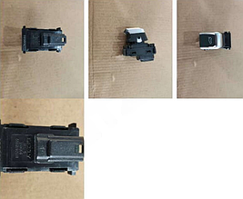 Кнопка открывания двери багажника в двери водителя Geely Tugella