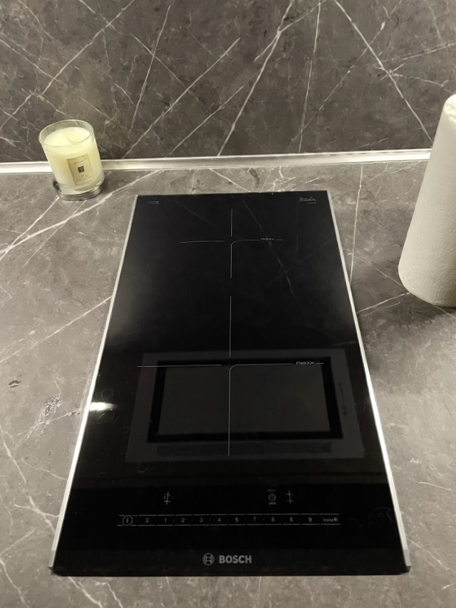 Индукционная варочная панель Bosch PIB375FB1E Домино черная стеклокерамика боковой профиль производство Испания