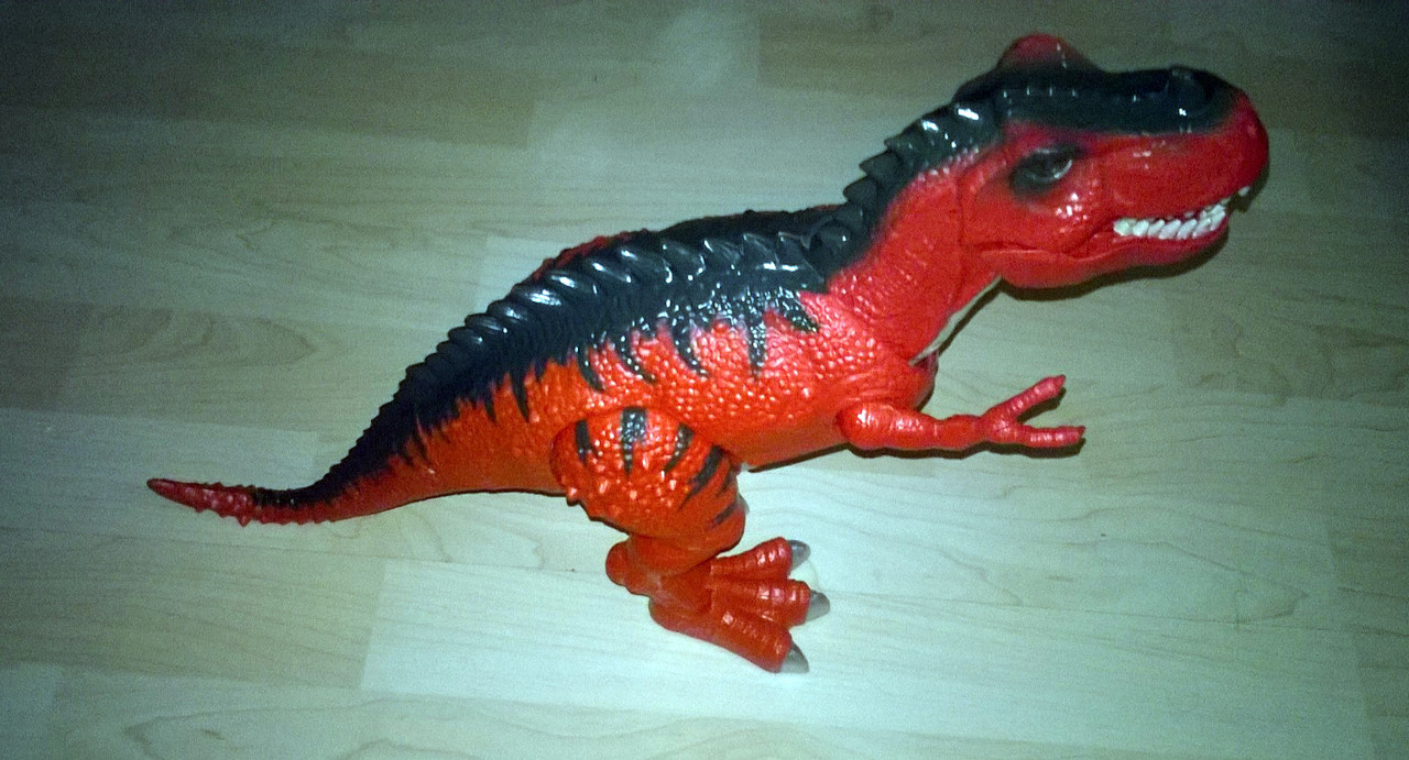 Игрушка динозавр Тираннозавр 40см с проектором (двиг.свет.муз.)