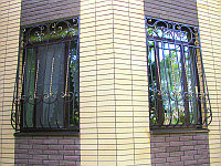 Решетки на окна объемные с витушками из ковки модель 163