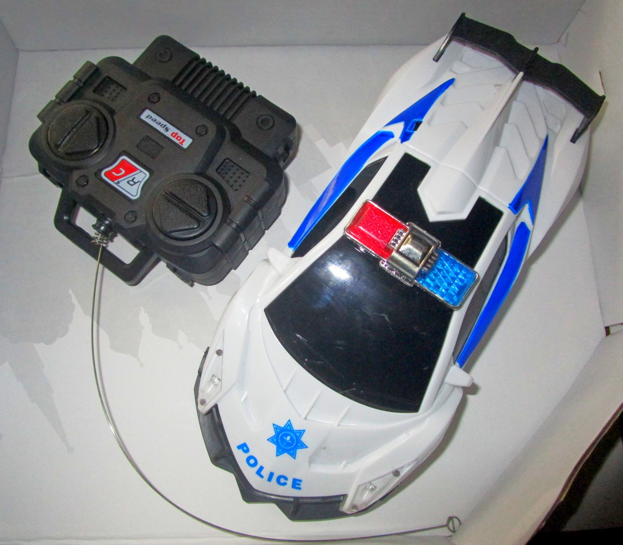 Радиоуправляемая машинка police 1:20 (свет.) - фото 1 - id-p49046750