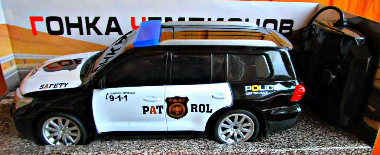 Радиоуправляемая машина "Полиция 911-2" аккум.свет.+резин. покрышки - фото 1 - id-p68683582