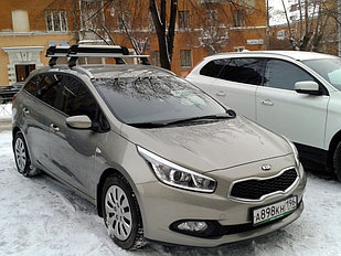 Багажник Атлант для Kia Ceed, универсал, с 2012г.- на рейлинги, (крыловидная дуга)